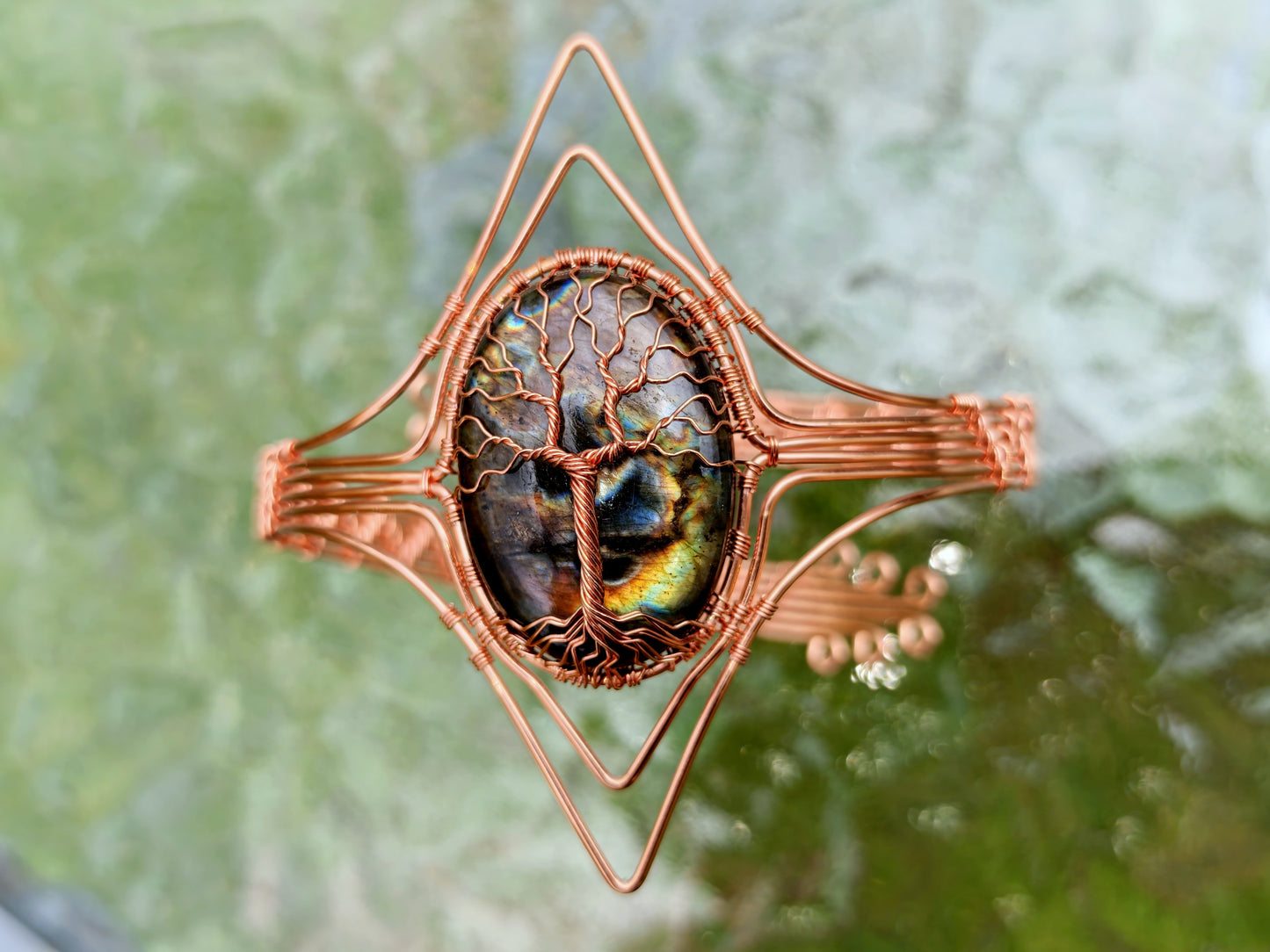 Tree arm ring with a labradorite gemstone