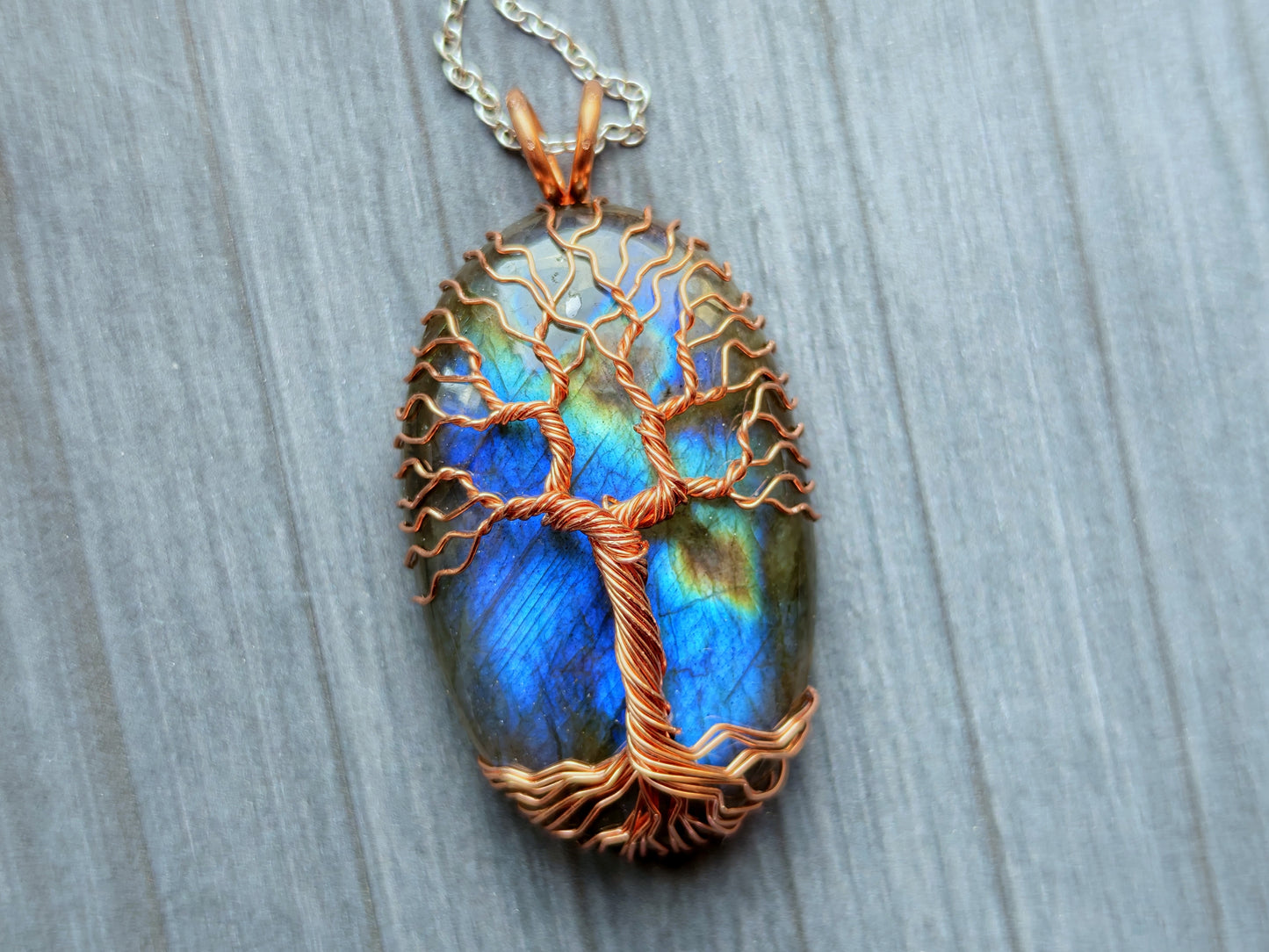 Tree pendant with a labradorite gemstone