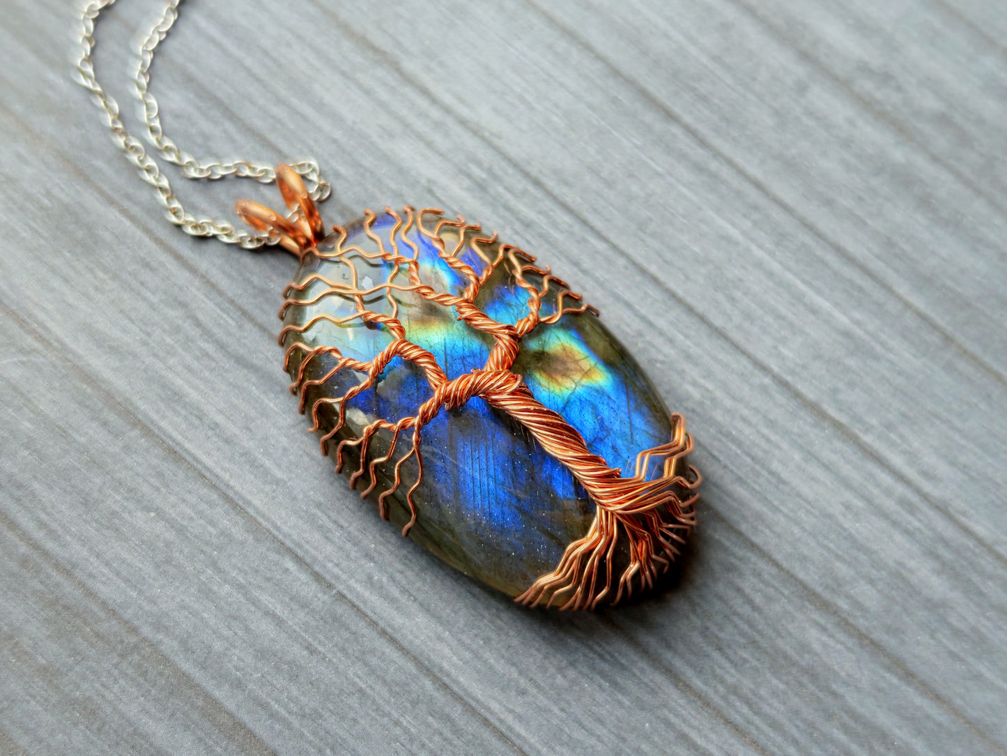 Tree pendant with a labradorite gemstone
