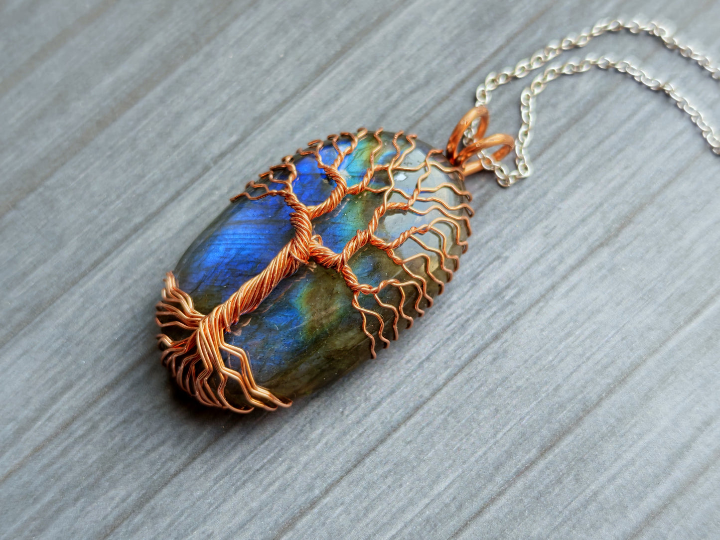 Tree pendant with a labradorite gemstone