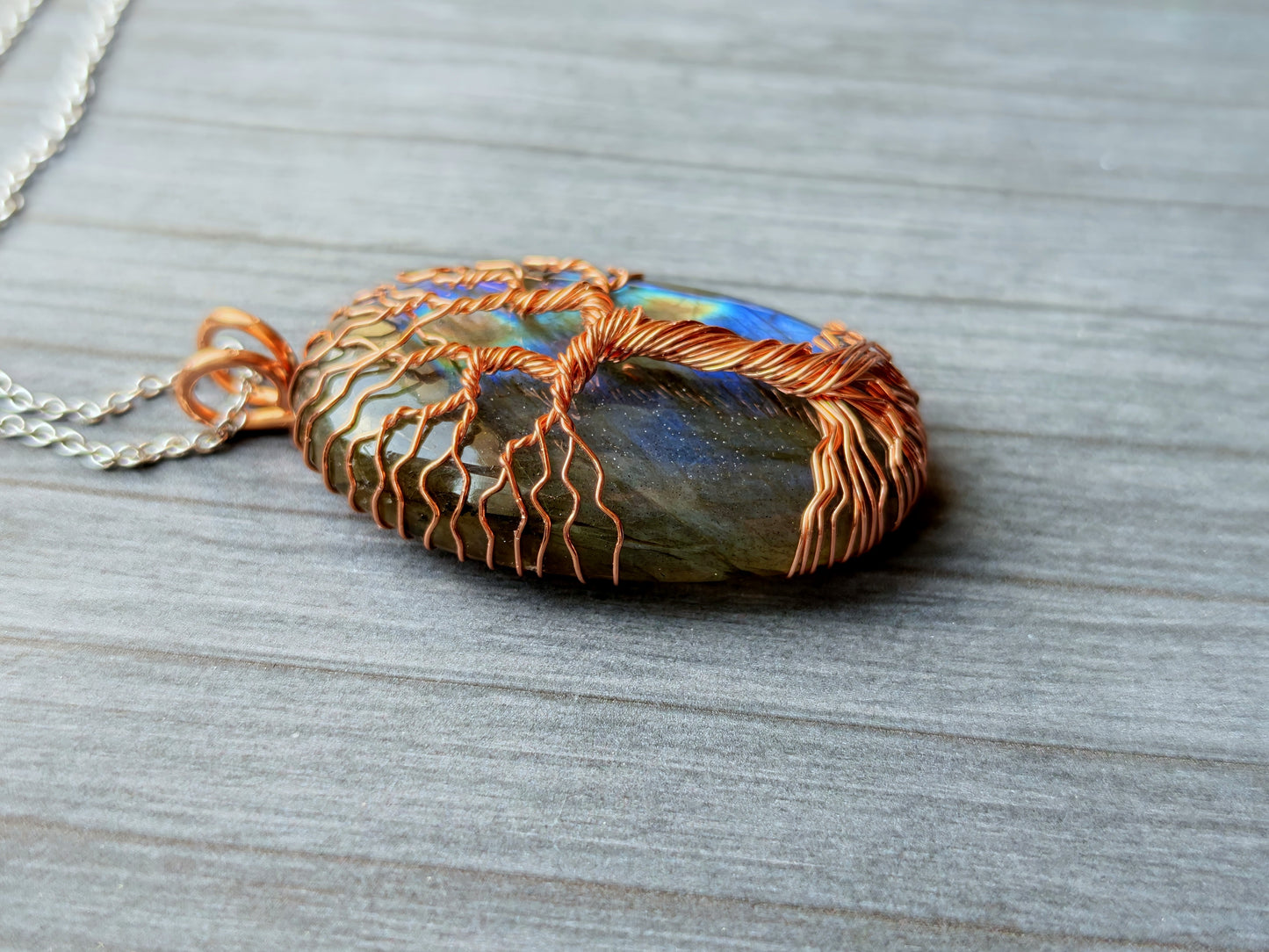 Tree pendant with a labradorite gemstone