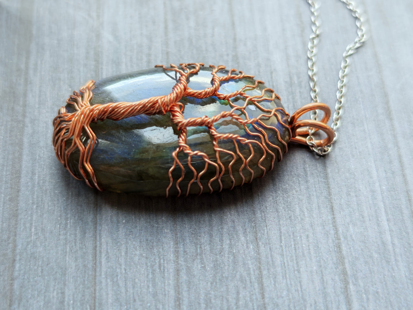 Tree pendant with a labradorite gemstone