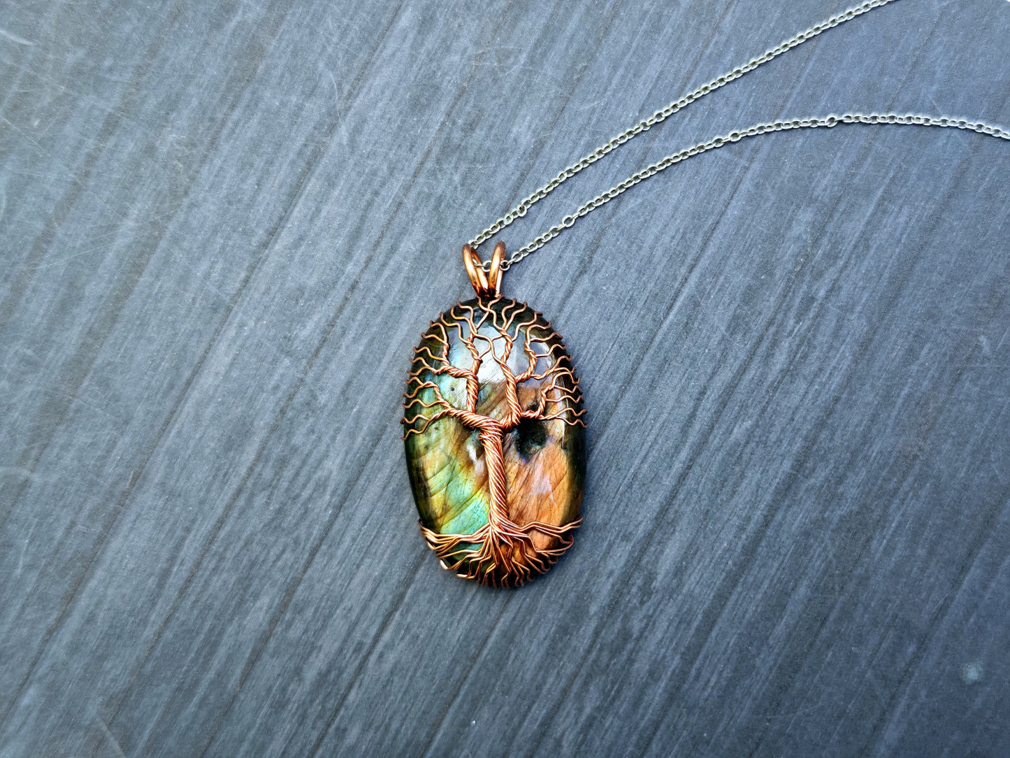 Tree pendant with a labradorite gemstone
