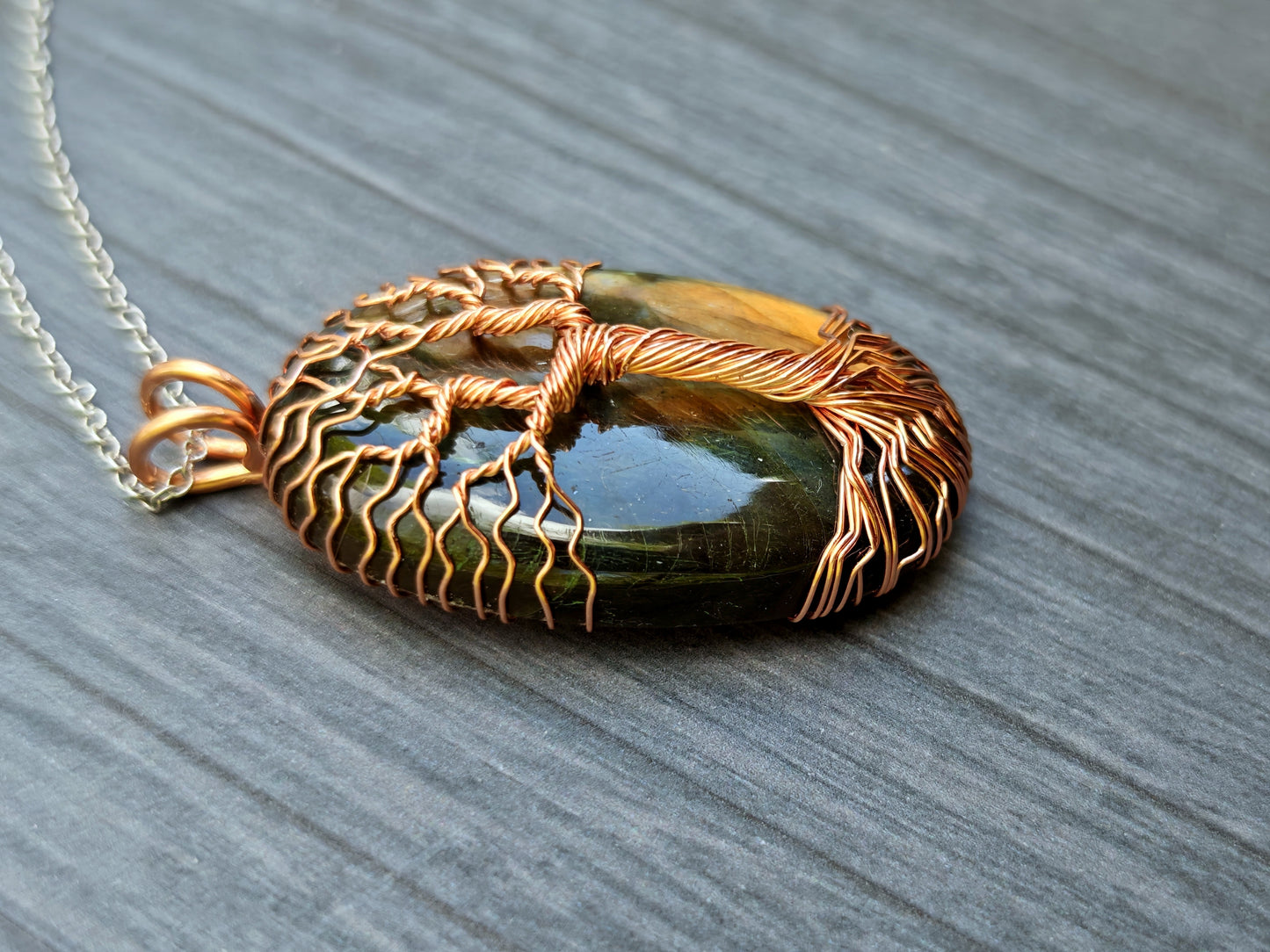 Tree pendant with a labradorite gemstone
