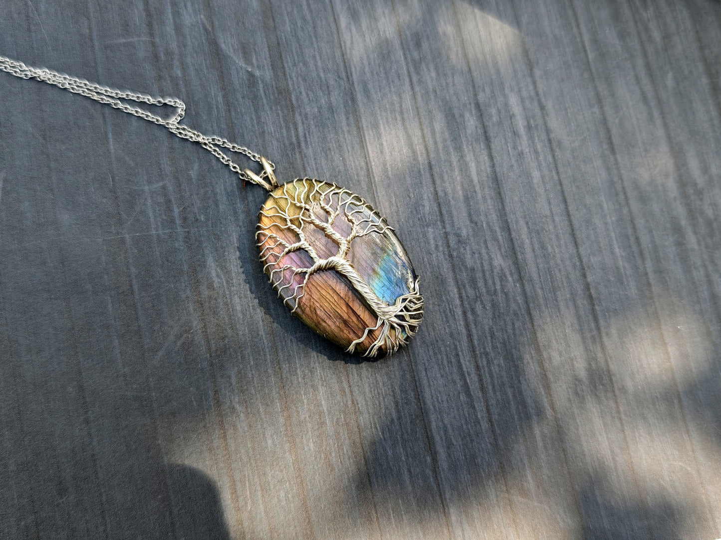 Tree pendant with a labradorite gemstone