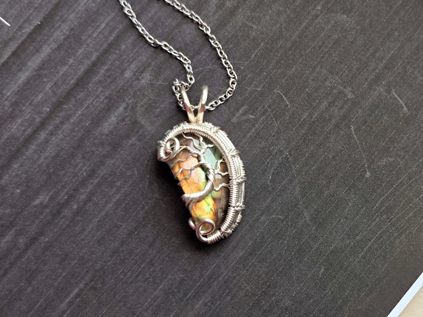 Tree pendant with a broken labradorite gemstone