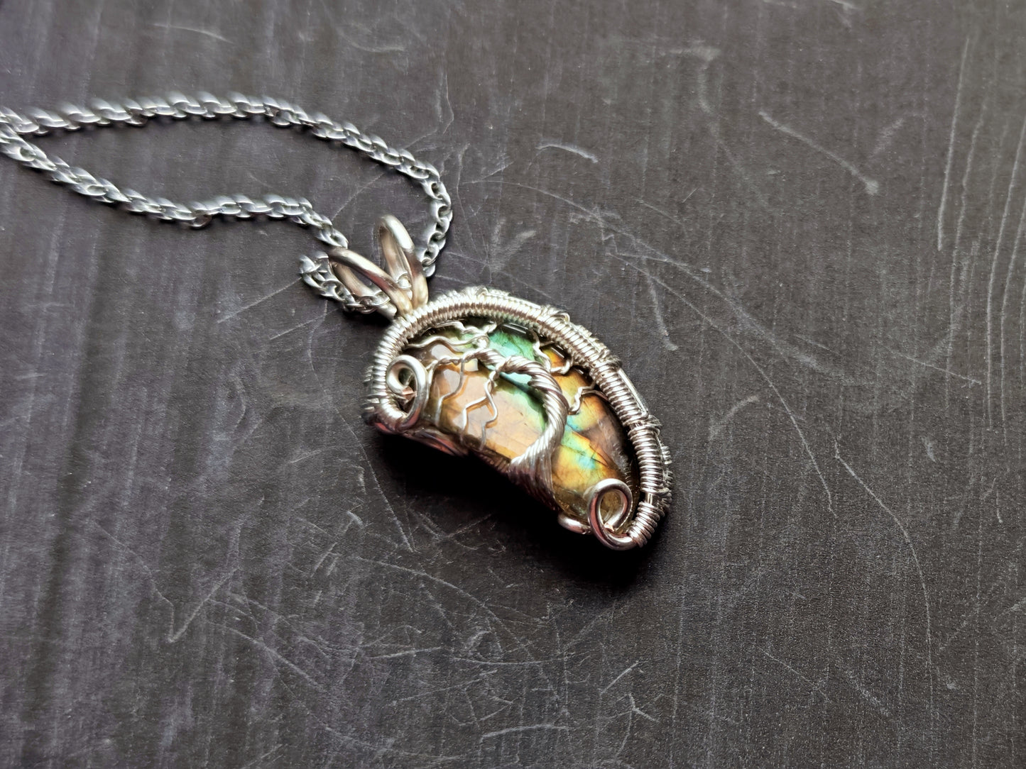 Tree pendant with a broken labradorite gemstone