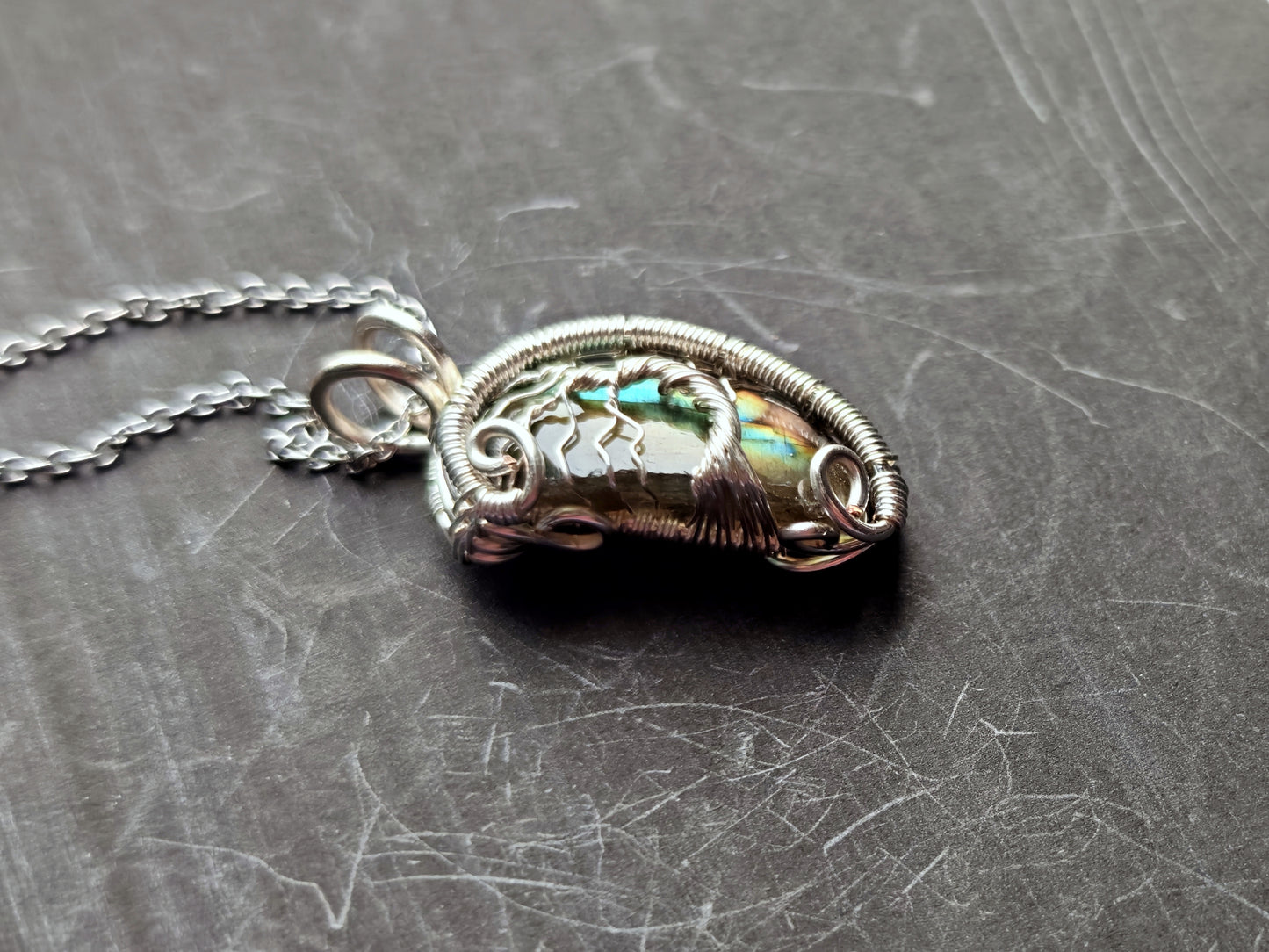 Tree pendant with a broken labradorite gemstone