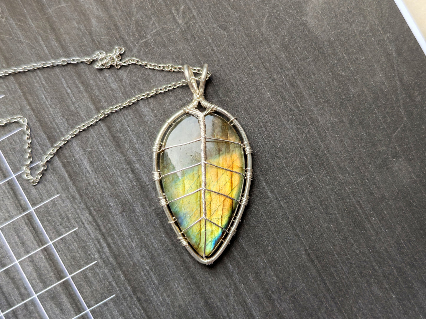 Leaf pendant with a labradorite gemstone