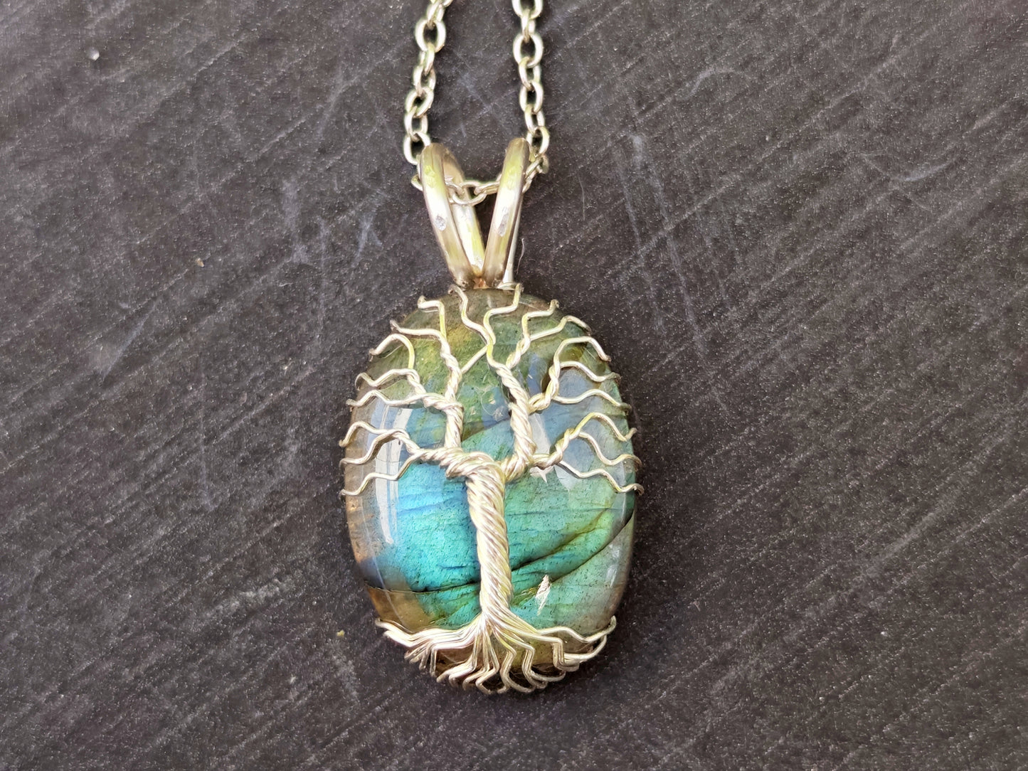 Tree pendant with a labradorite gemstone