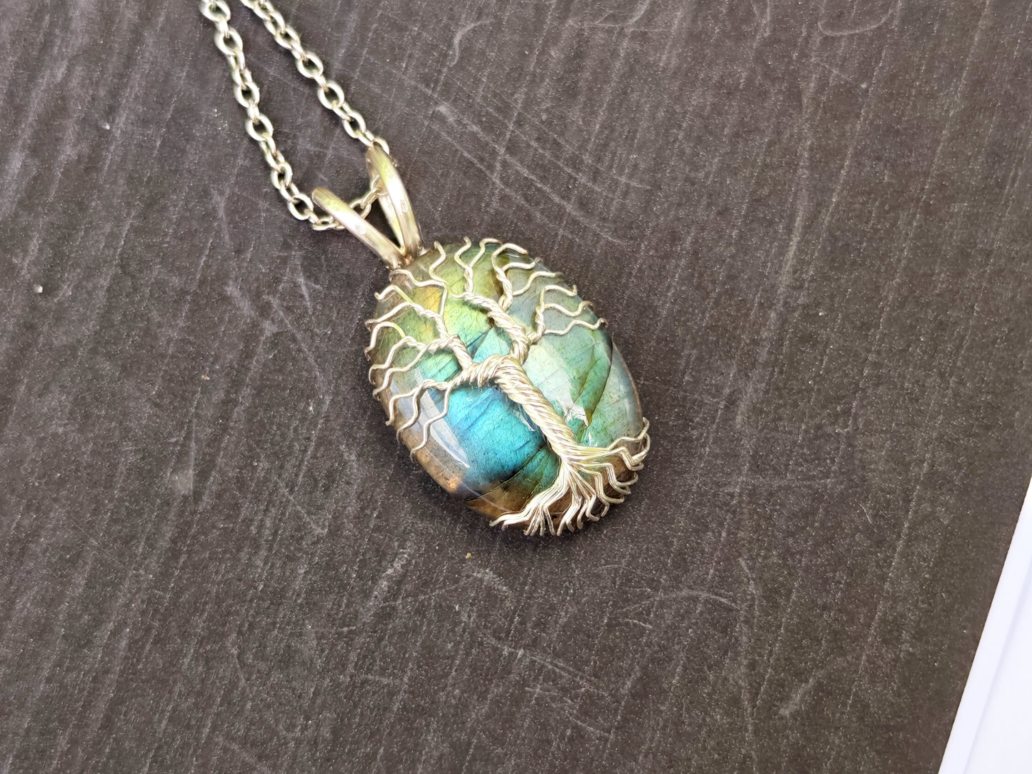 Tree pendant with a labradorite gemstone