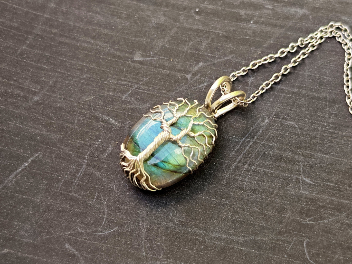 Tree pendant with a labradorite gemstone