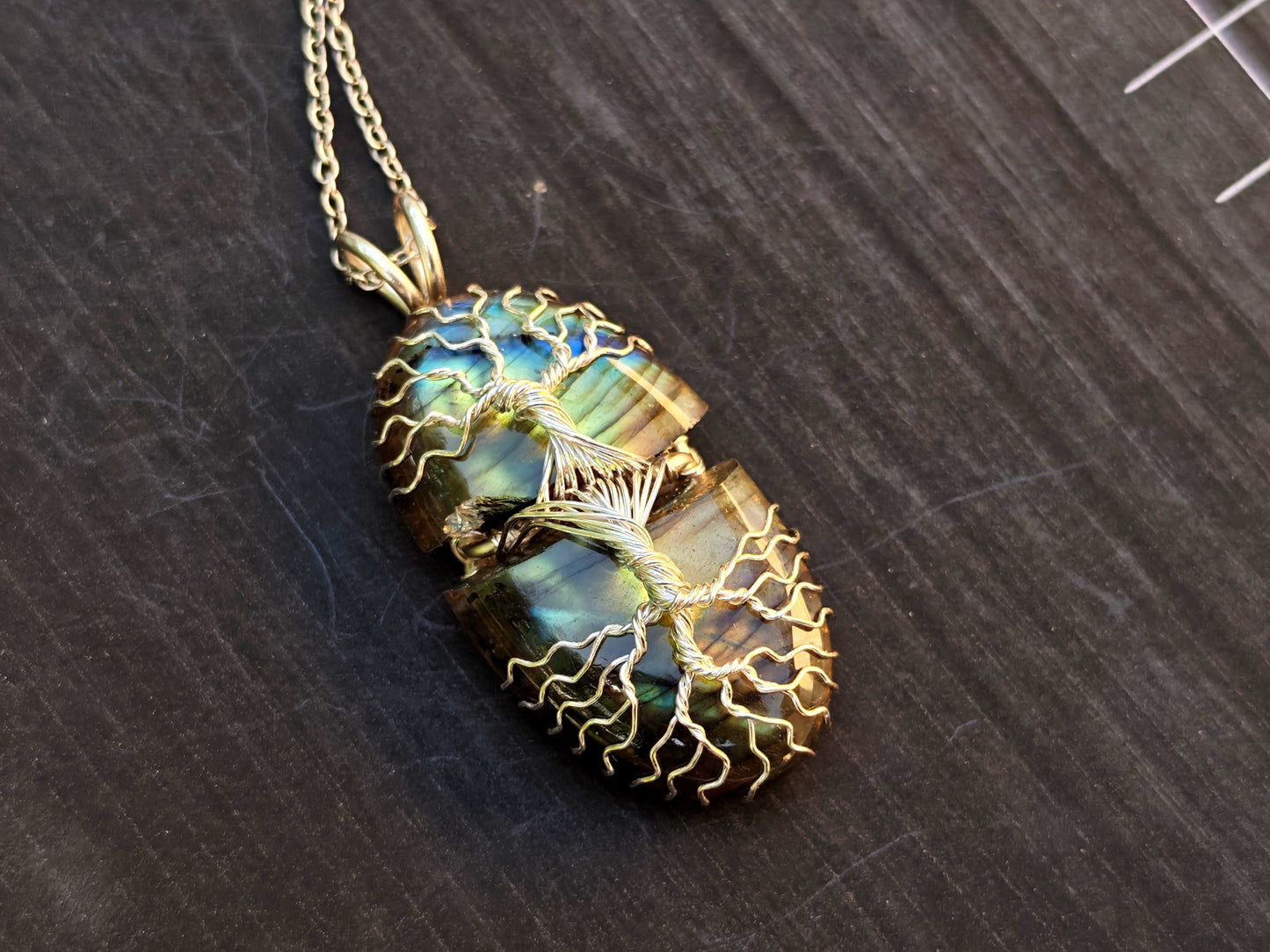 Tree pendant with a broken labradorite gemstone