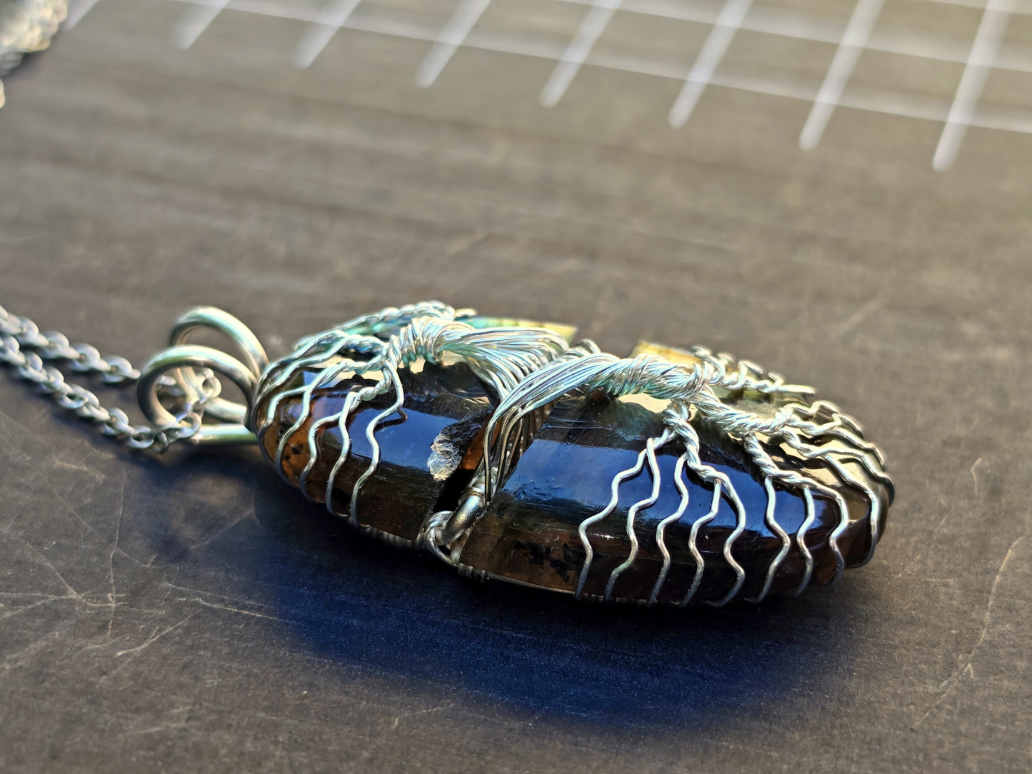Tree pendant with a broken labradorite gemstone
