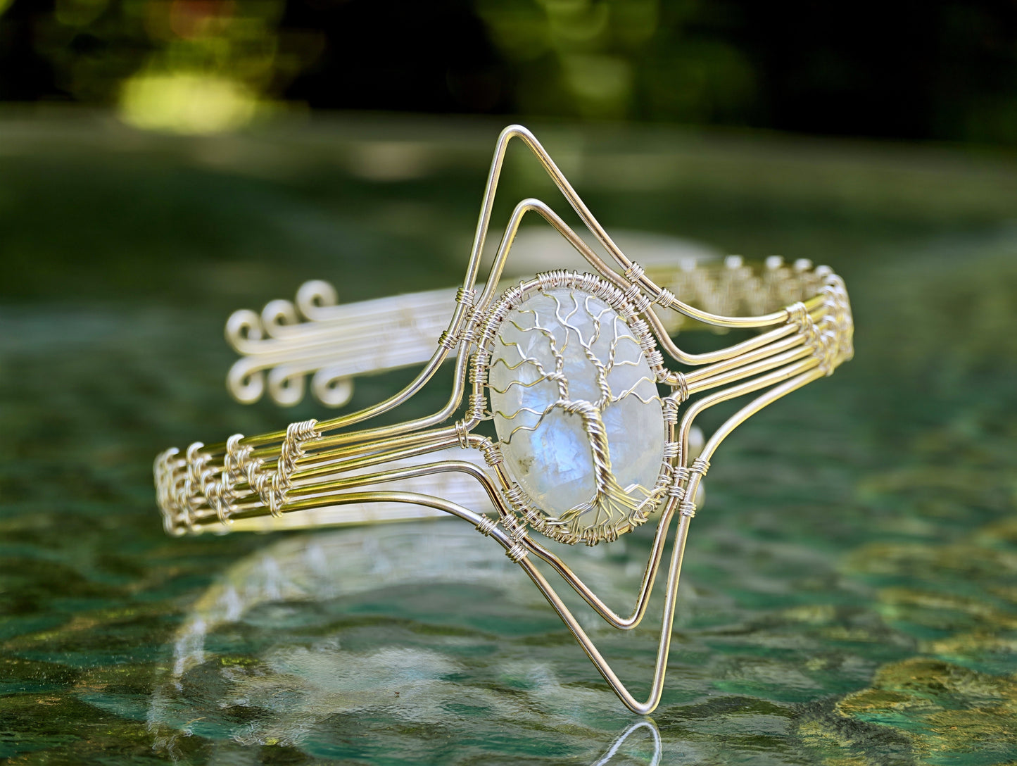 Tree arm ring with a moonstone gemstone