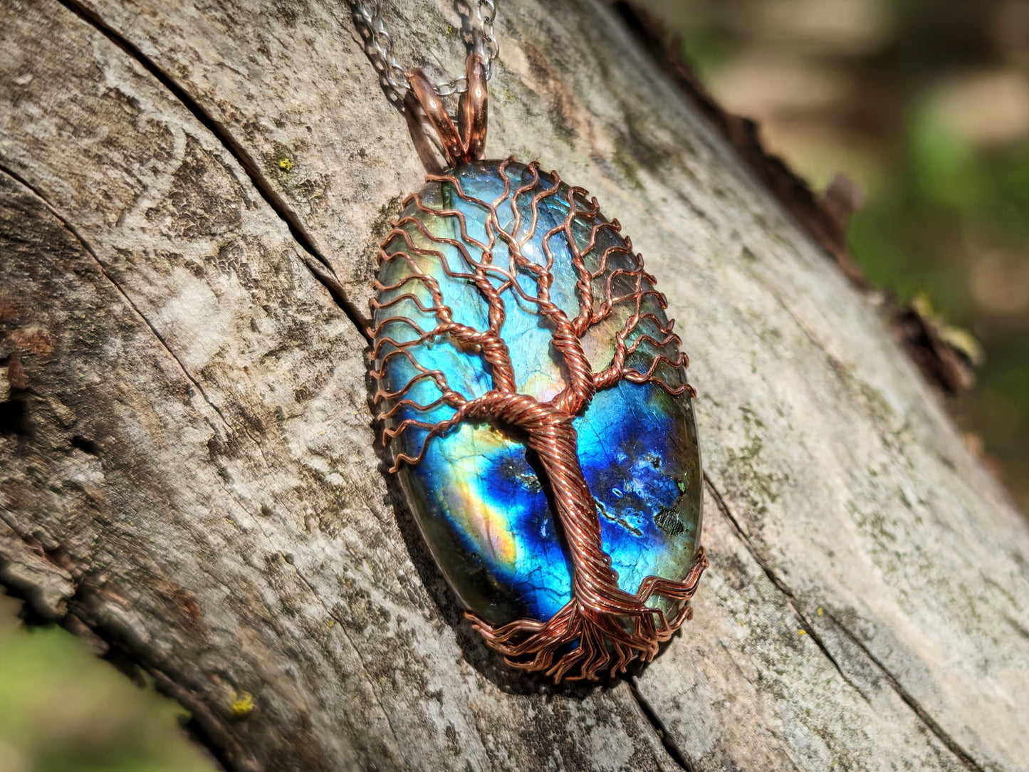 Tree pendant with a labradorite gemstone