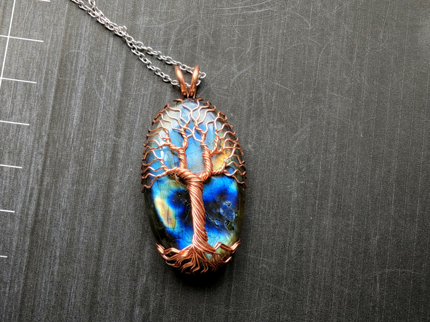 Tree pendant with a labradorite gemstone
