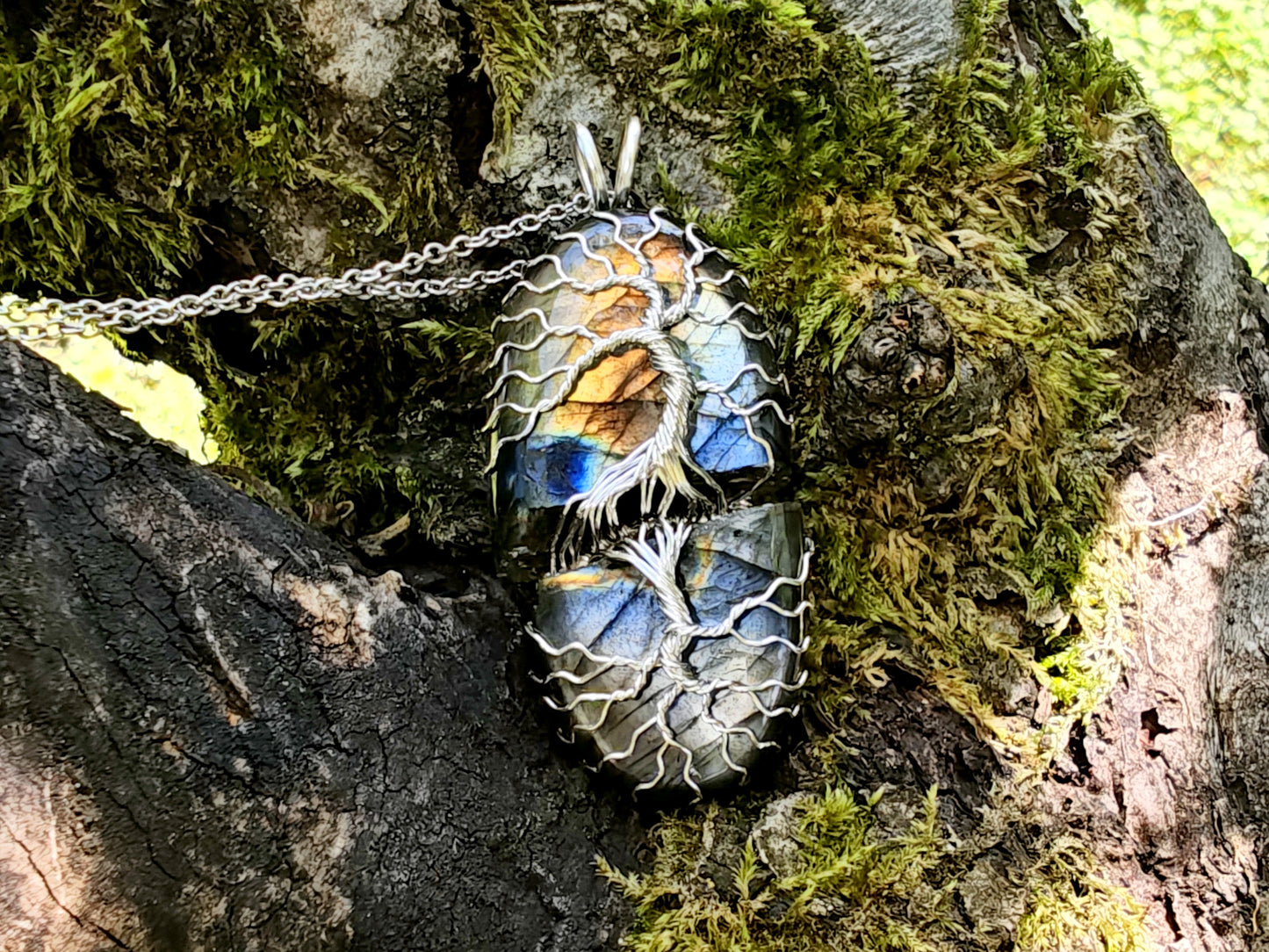 Tree pendant with a broken labradorite gemstone