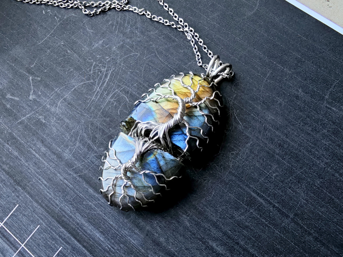 Tree pendant with a broken labradorite gemstone