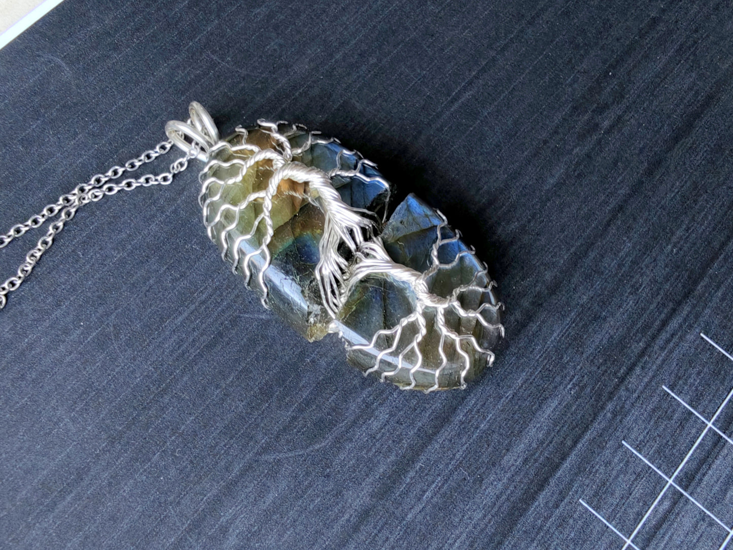 Tree pendant with a broken labradorite gemstone
