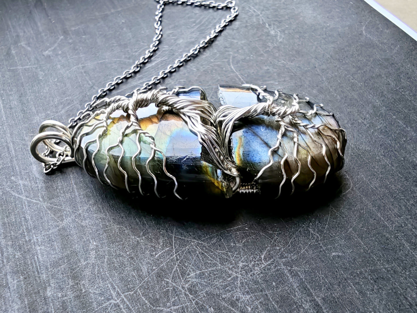 Tree pendant with a broken labradorite gemstone