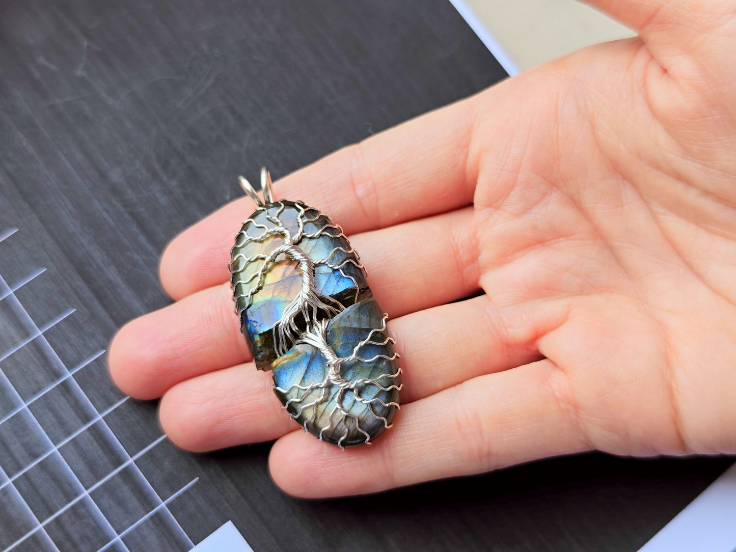 Tree pendant with a broken labradorite gemstone