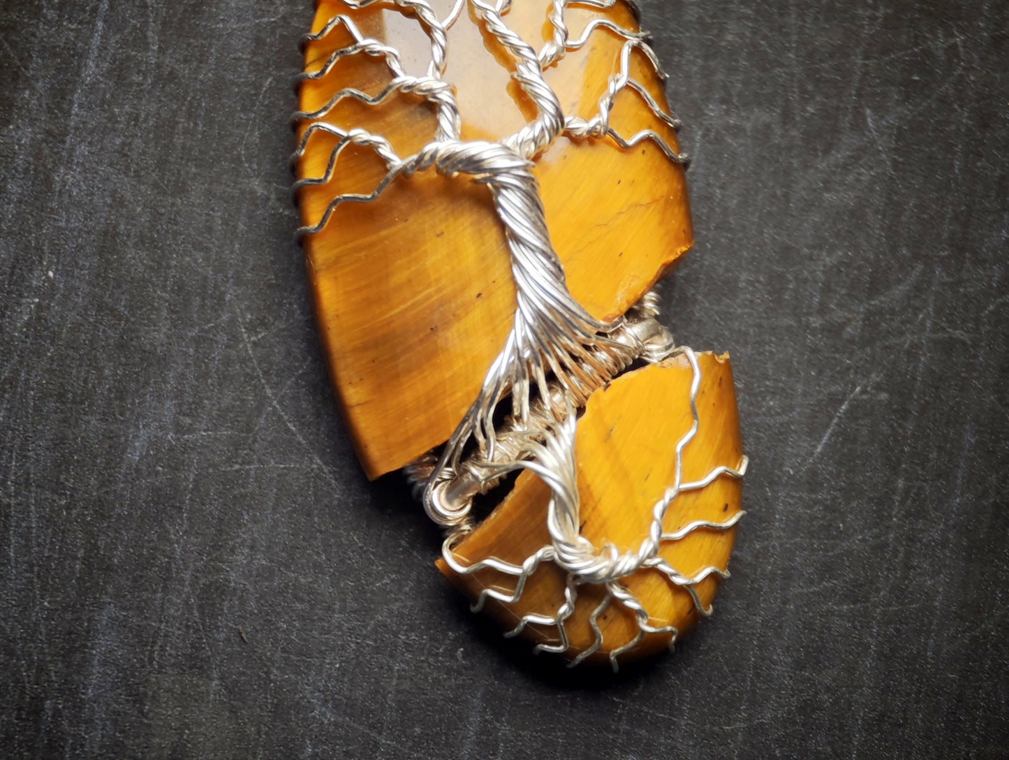 Tree pendant with a broken tiger's eye gemstone