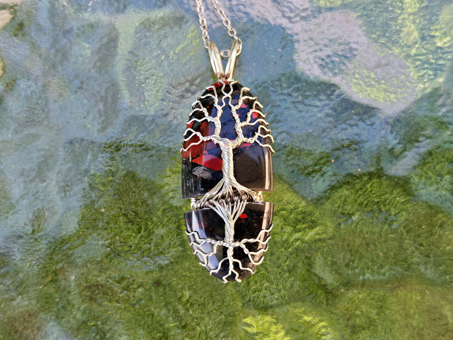 Tree pendant with a broken bloodstone gemstone