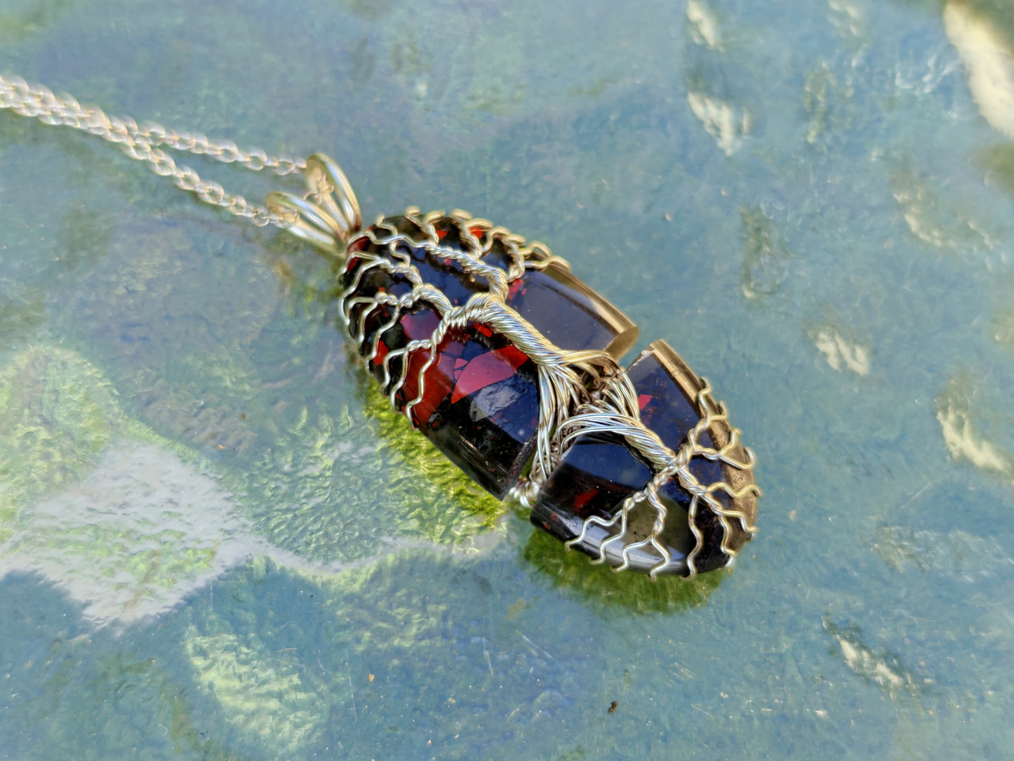 Tree pendant with a broken bloodstone gemstone