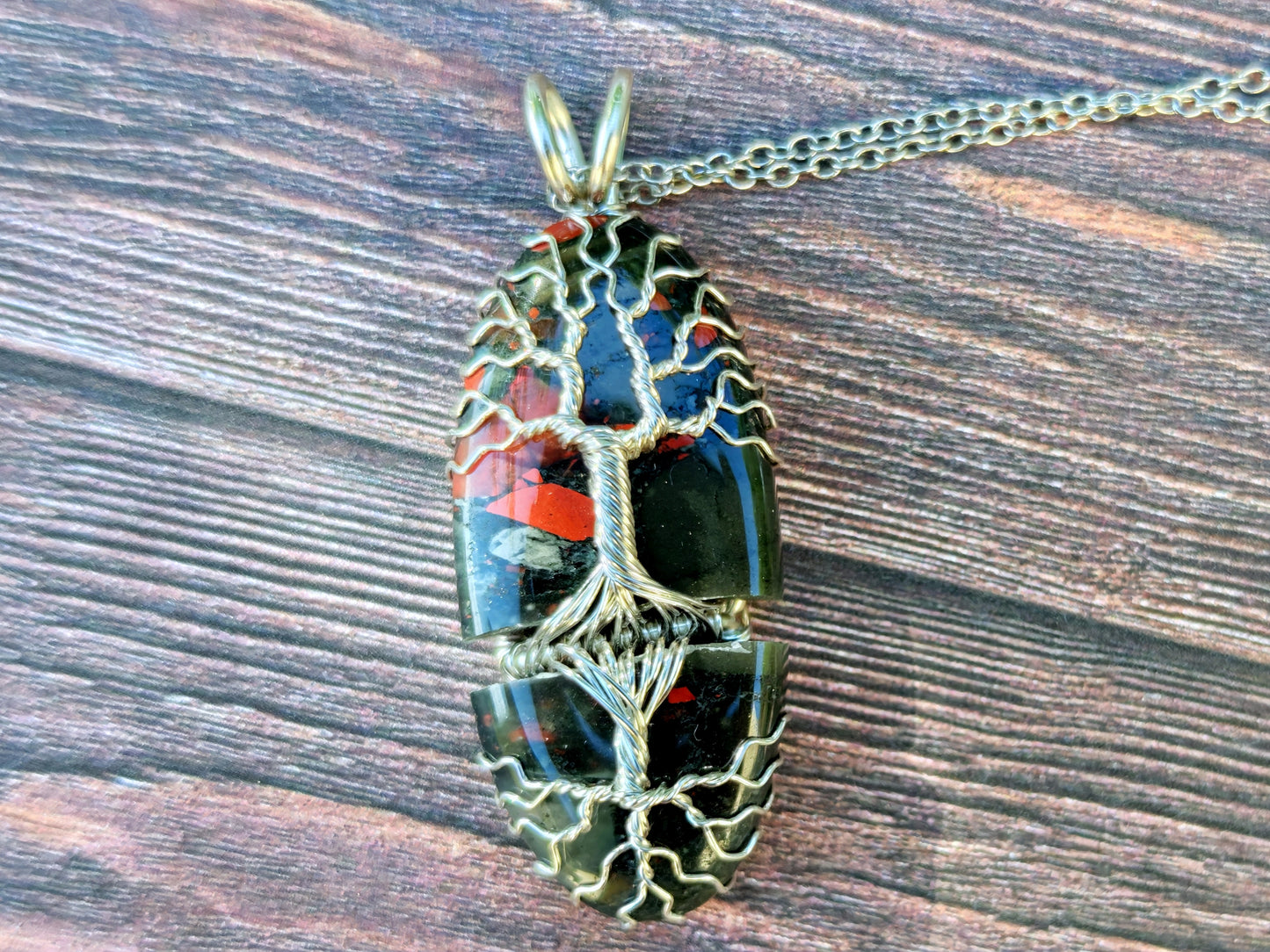 Tree pendant with a broken bloodstone gemstone