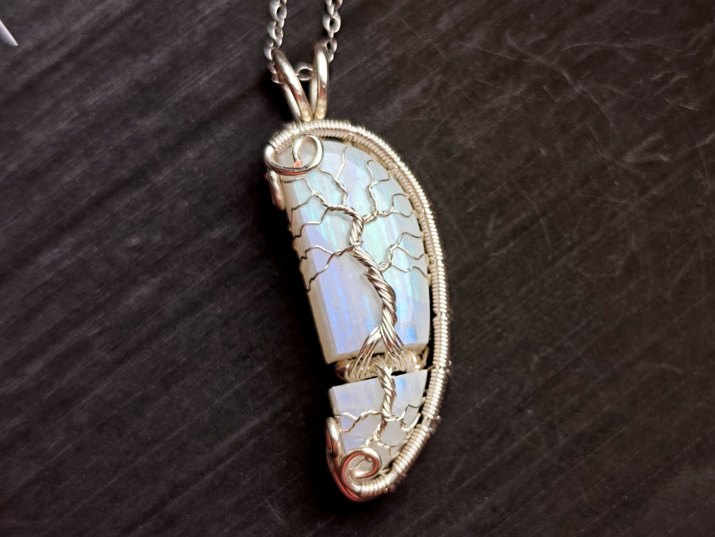Tree pendant with a broken moonstone
