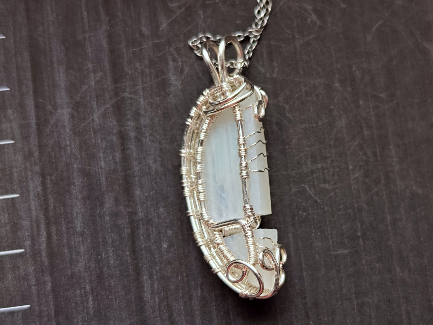 Tree pendant with a broken moonstone