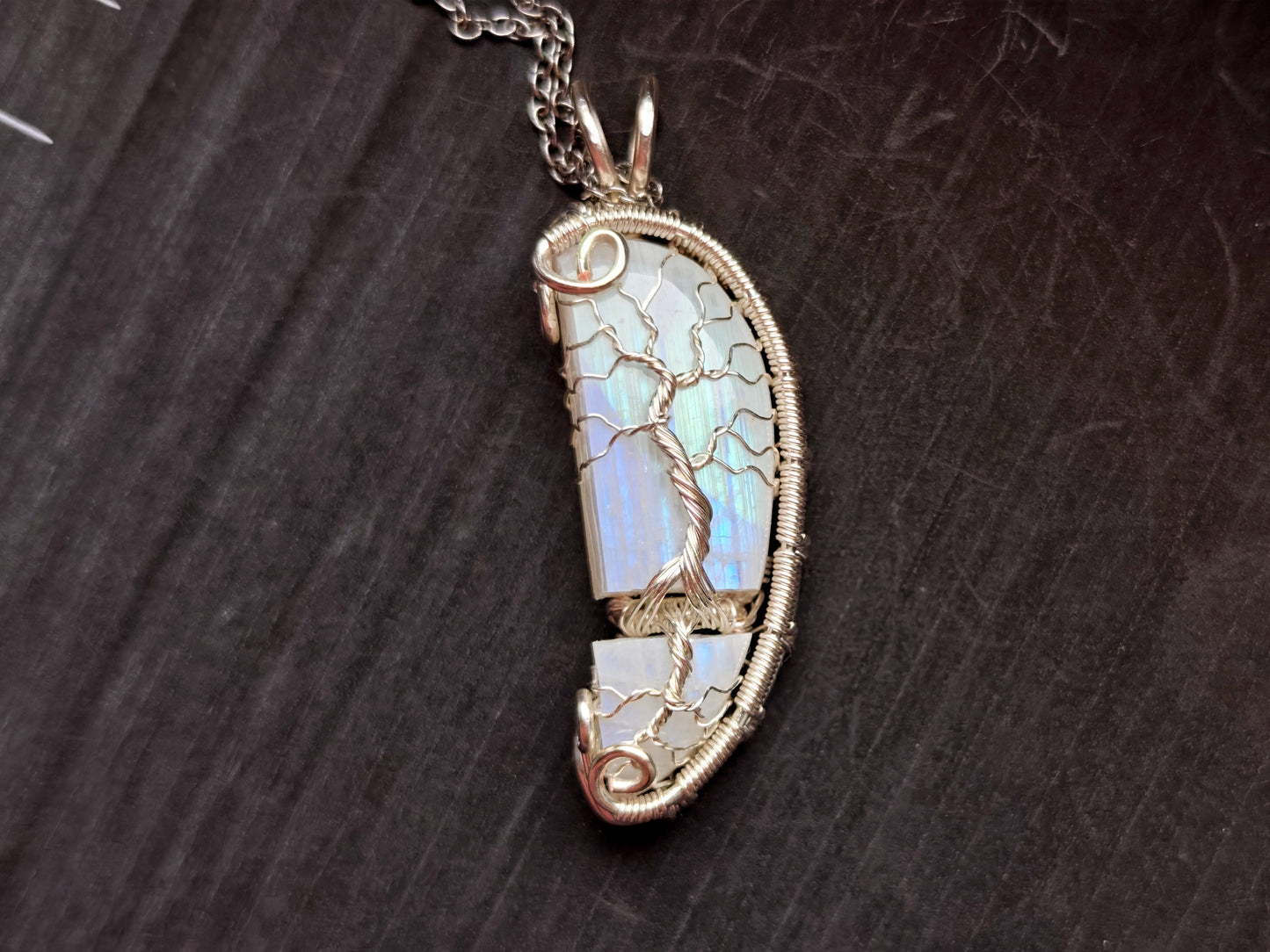 Tree pendant with a broken moonstone