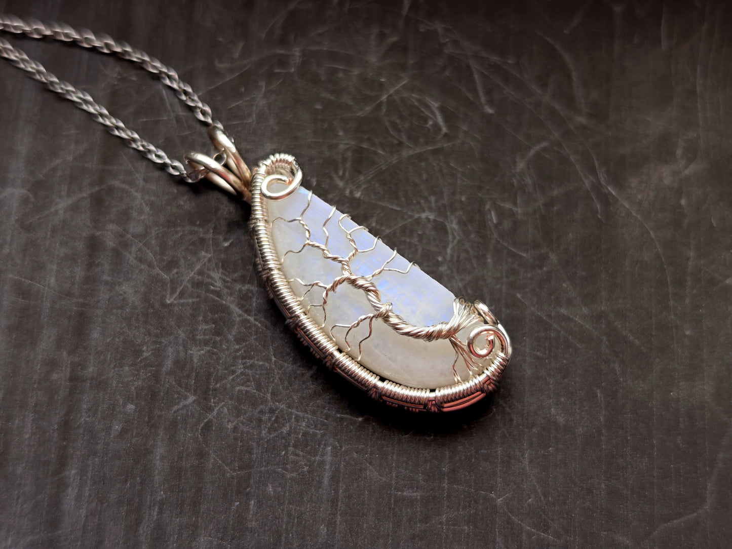 Tree pendant with a broken moonstone