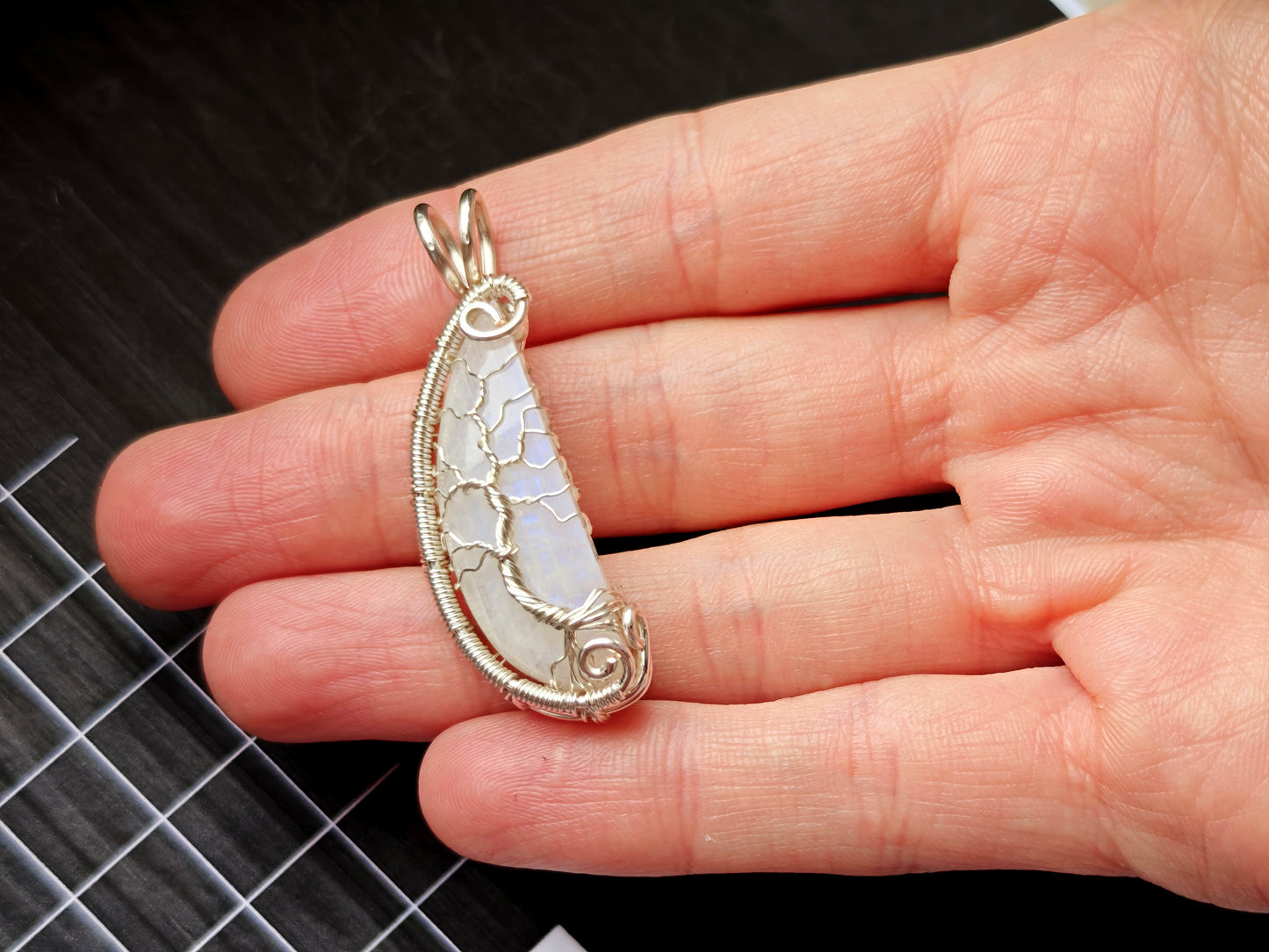Tree pendant with a broken moonstone