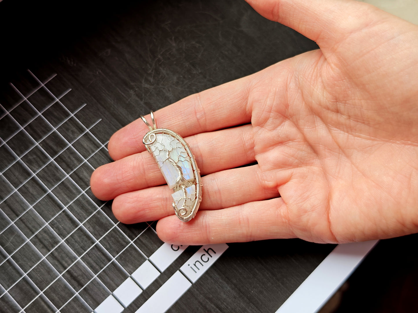 Tree pendant with a broken moonstone