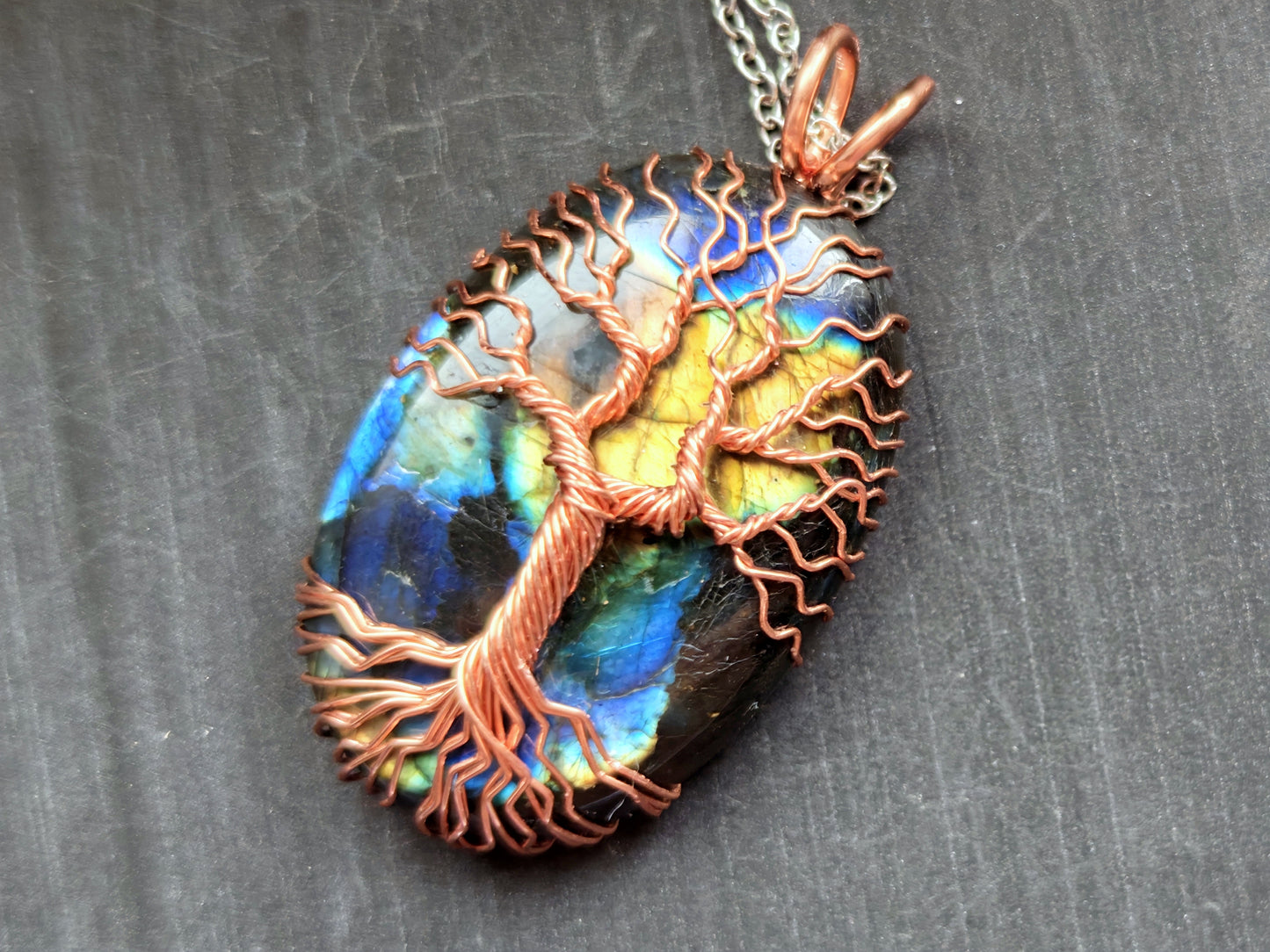 Tree pendant with a labradorite gemstone