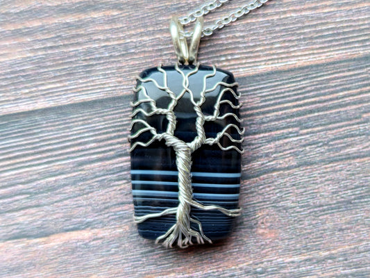 Tree pendant with a black onyx gemstone