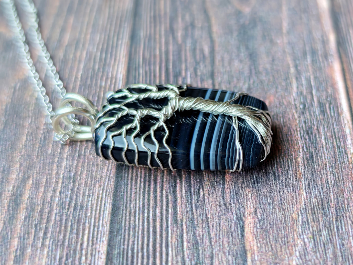Tree pendant with a black onyx gemstone