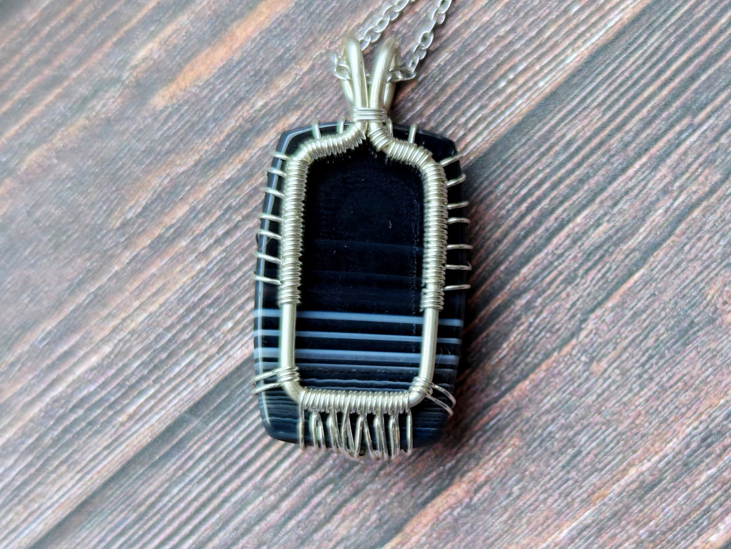 Tree pendant with a black onyx gemstone