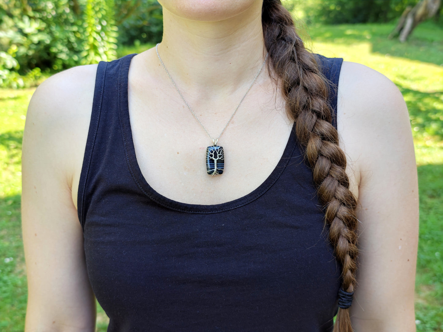 Tree pendant with a black onyx gemstone