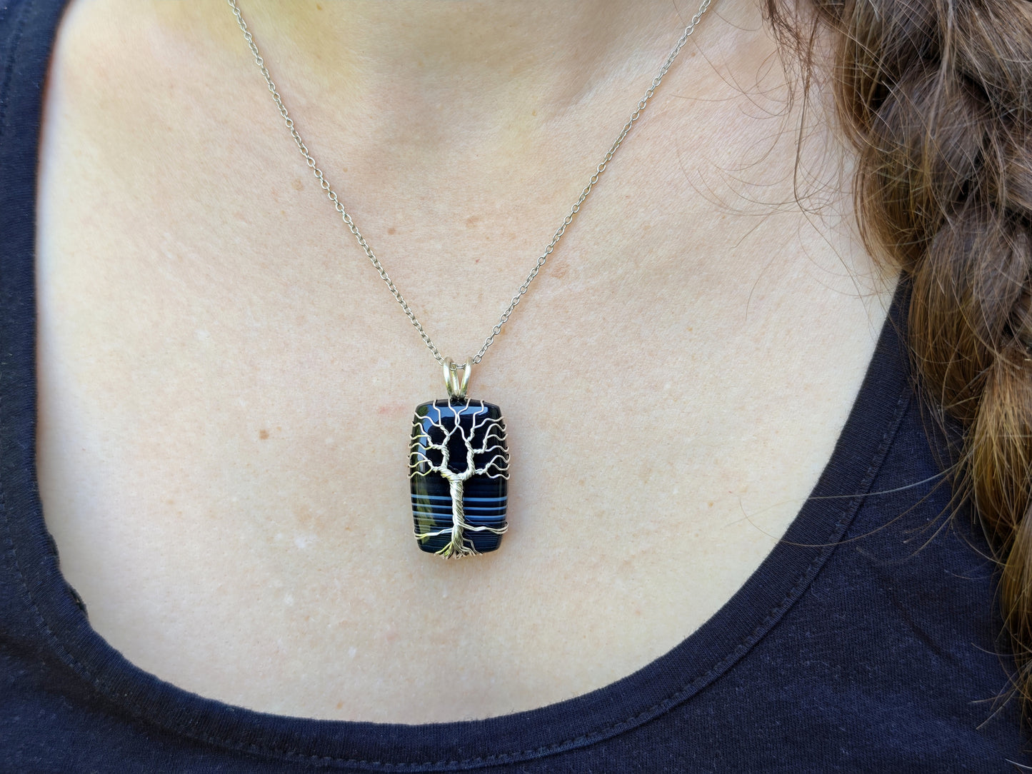 Tree pendant with a black onyx gemstone