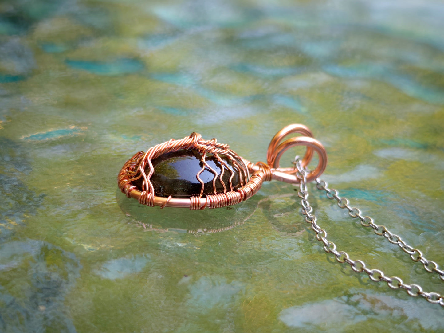 Tree pendant with a labradorite gemstone