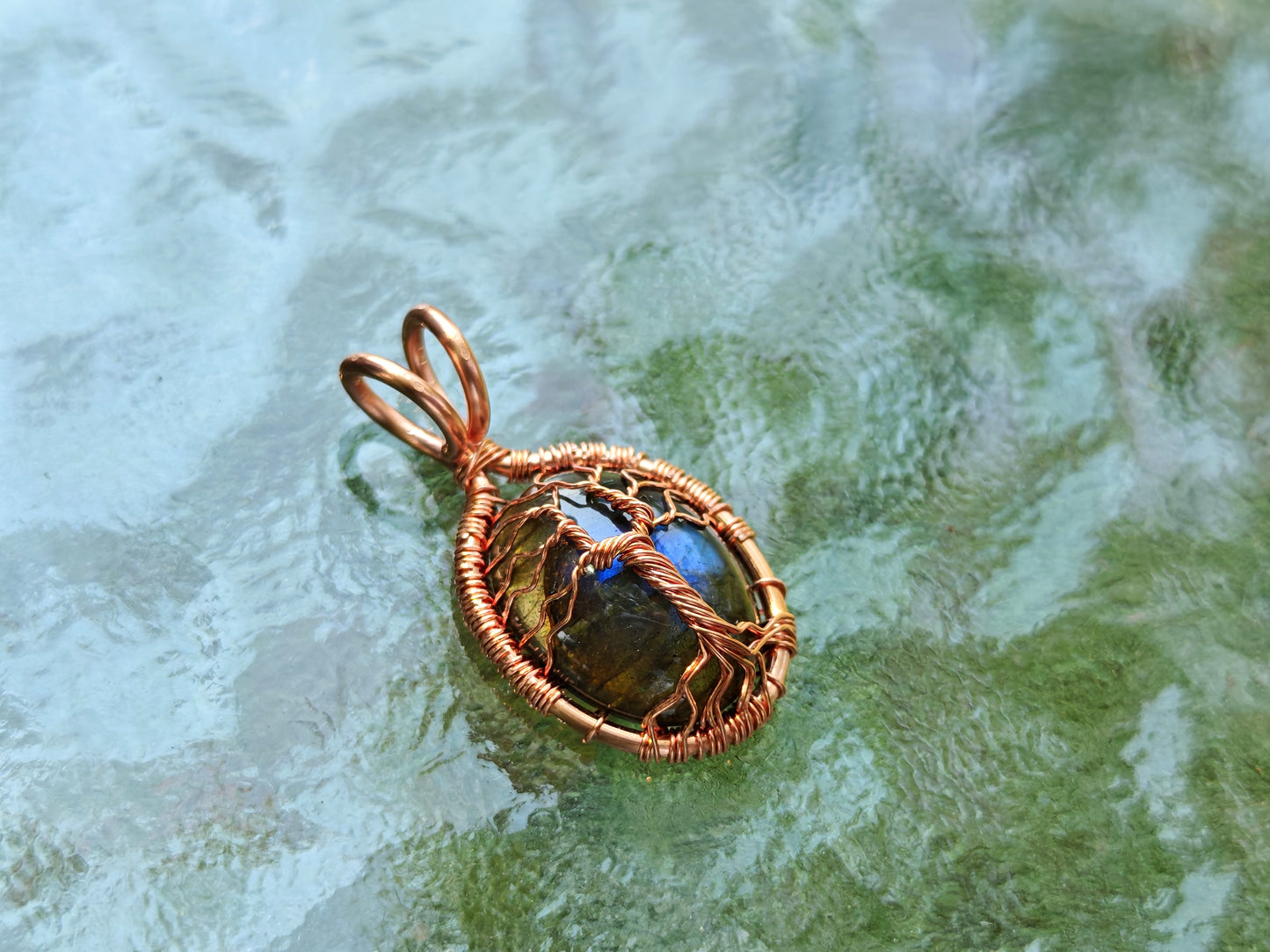 Tree pendant with a labradorite gemstone