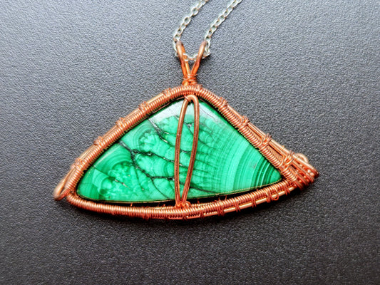 Dragon's eye pendant with a malachite moonstone