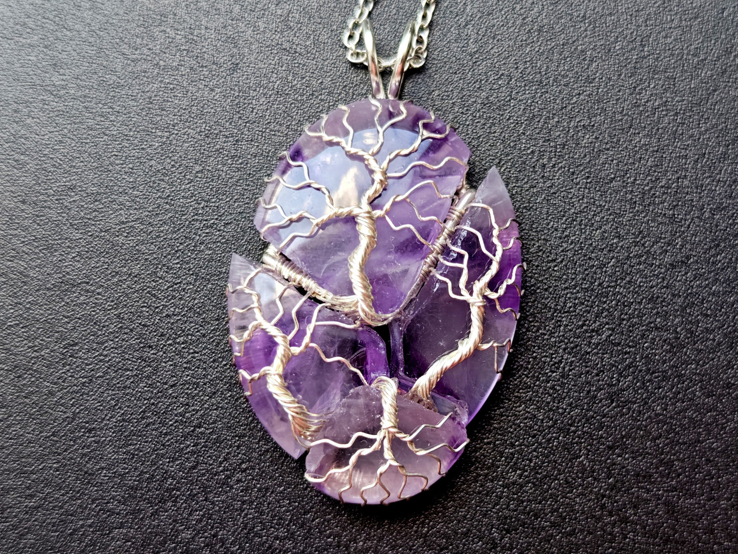 Tree pendant with a broken amethyst gemstone