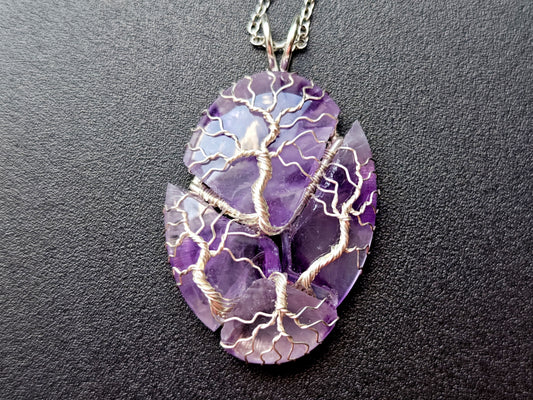 Tree pendant with a broken amethyst gemstone