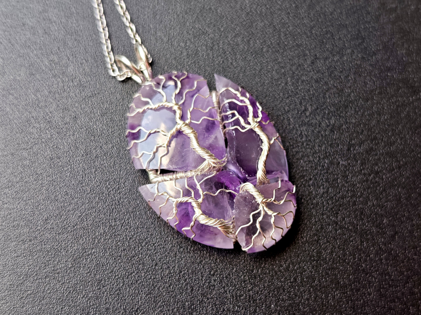 Tree pendant with a broken amethyst gemstone