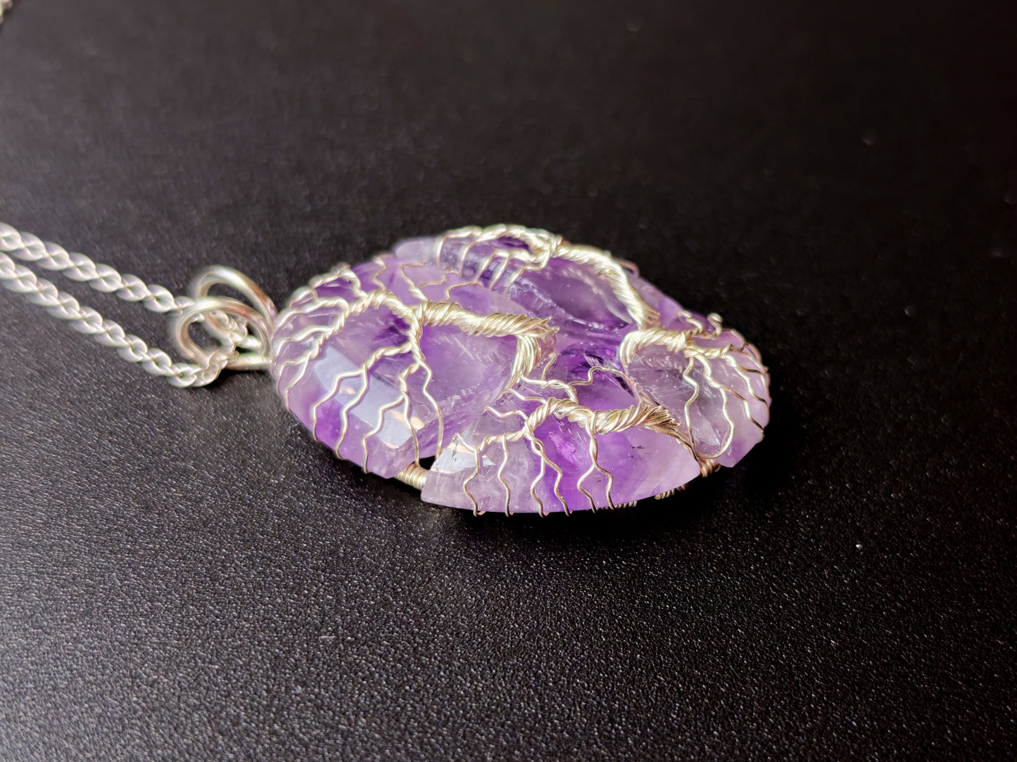 Tree pendant with a broken amethyst gemstone