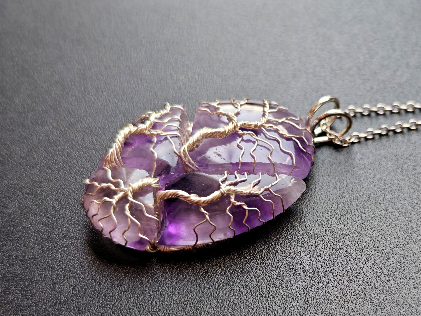 Tree pendant with a broken amethyst gemstone